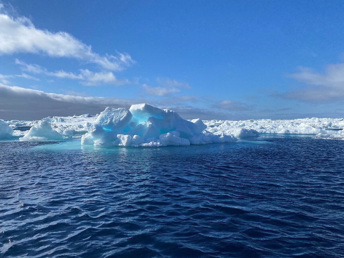 Final zodiac cruise in Antarctica, with stunning visuals from the sun hitting the ice shining a bright blue. Photo credit Hokonui Rūnanga.