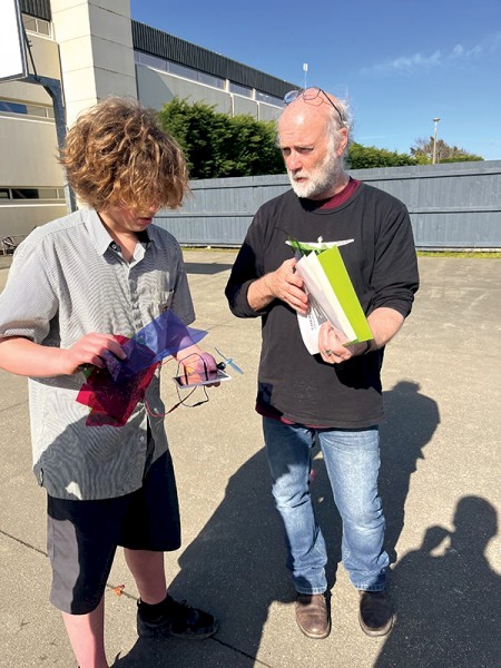 Dr David Warren (right) has been inspiring students to think about science and its role in society for years.